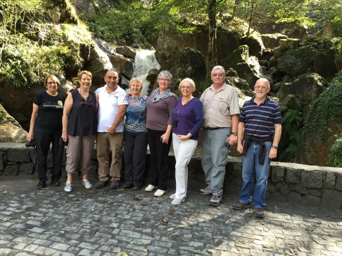 Fazli Karabacak with tour group at a waterfall in Turkey